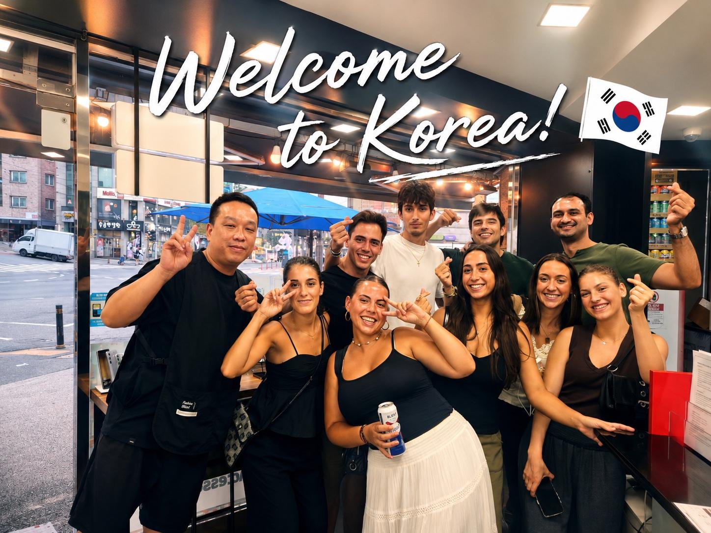 International customers together at the WS_Phoneshop counter after activating their lines, over the words "Welcome to Korea!"